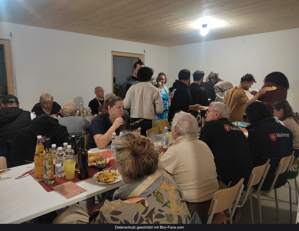 Essen mit Geflüchteten